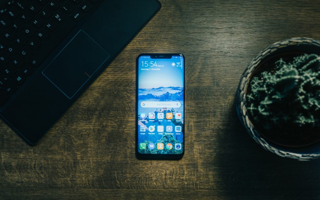 Tablet and unlocked phone on table